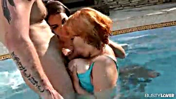 Girls share cock in steamy pool threesome