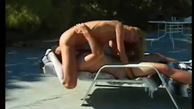 An older couple fucks by the pool 