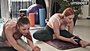 Lesbians Kiara, Angelica, and Monika engage in hot yoga sex