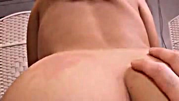 Man's dick enters woman's ass, causing pleasure