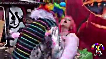 Some chick gets smashed by a clown, dude