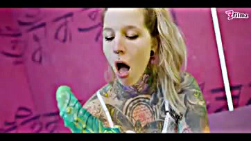 Explicit hardcore sex scene with tattooed girl and toys