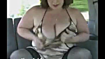 Woman masturbates while husband drives, explicit content