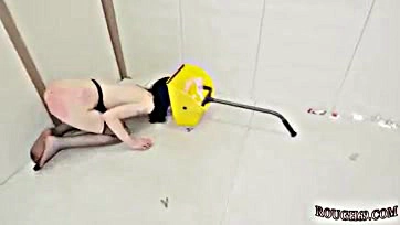 Intense BDSM anal play involving extreme fisting