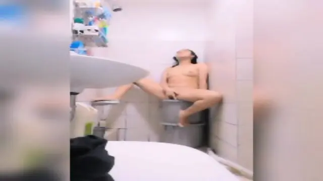 Cute girl with glasses take a bath and touch herself