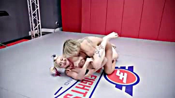 Lesbians engage in explicit wrestling and oral sex