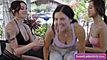 Lesbians engage in outdoor kissing and intimate activities