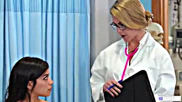 Lesbians get naughty in an exam room