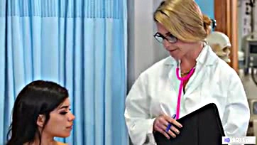 Lesbians get naughty in an exam room