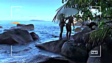 Man secretly films naked couple having sex on beach