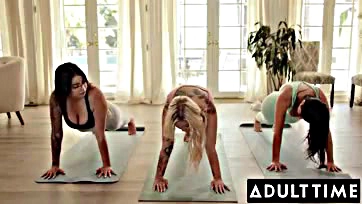 Two women get intimate with a curvy yoga instructor