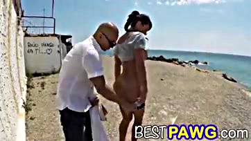 Woman has explicit sex by beach in public