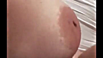 Wife receives excessive semen on large breasts