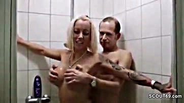 German mature woman gets surprised and fucked in shower