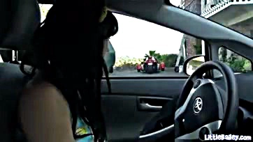 Teen plays with her tight pussy in a car