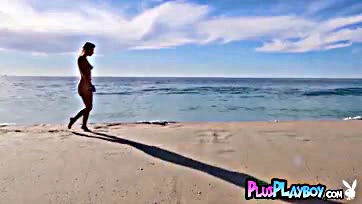 Milf lifeguard flaunts perfect breasts on sunny beach