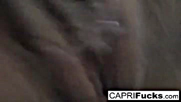 Capri Cavanni masturbates with her wet vulva