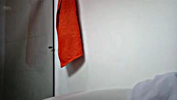 Natural Latina's tits exposed in bathroom video