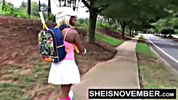 Young ebony flashes ass and pussy on the street