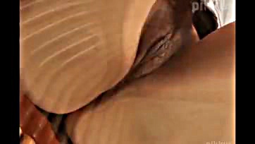 Woman's genitalia is touched, resulting in pleasure