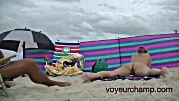 MILF voyeur POV features explicit nude beach scenes