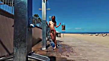 Sasha gets naked at public beach shower in Spain