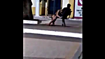 Naughty girl sucks cock in city square