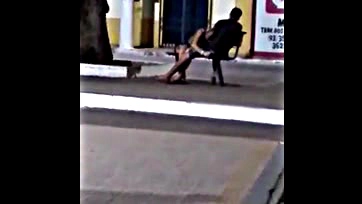 Naughty girl sucks cock in city square