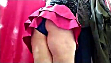 Mature woman flaunts her booty at the mall