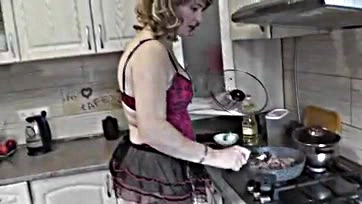 MILF cooks nude, shows all in kitchen