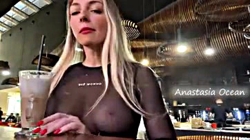 Blonde woman exposes breasts in public, gets attention