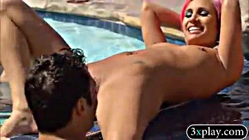 Swingers engage in explicit oral sex by the pool