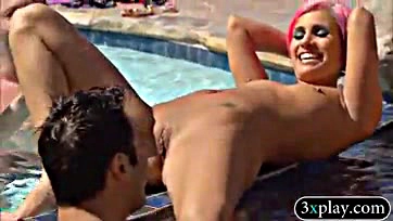 Swingers engage in explicit oral sex by the pool