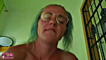 She's a horny, blue-haired, green-eyed cum-whore