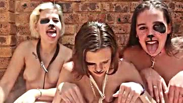 Three women engage in explicit oral and sensual behavior