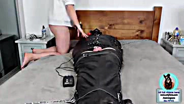 Male dominated by mistress in intense sensory deprivation