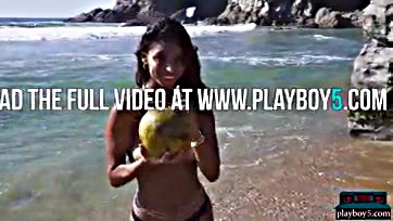 Teen Latina flaunts bare tits and ass on beach