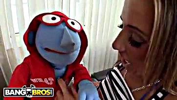 Rough sex between puppet and pornstar's massive breasts