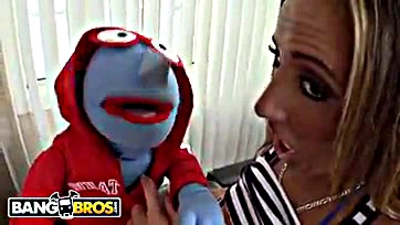 Rough sex between puppet and pornstar's massive breasts