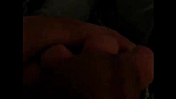 Teasing his penis with her foot during a call