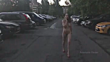 Topless chick strolls down public street, no shame