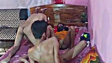 Four people, including two girls, engage in explicit sex