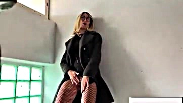 Blonde woman publicly masturbates in black stockings