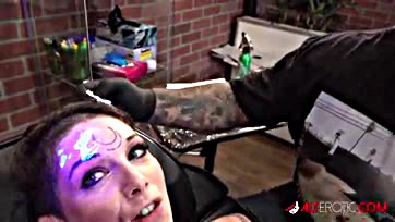 Fucked up chick inks weird tat on forehead