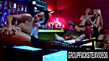 Strippers suck and swallow patrons' cocks in group sex