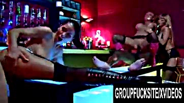 Strippers suck and swallow patrons' cocks in group sex