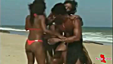 Three hot black women having wild beach sex