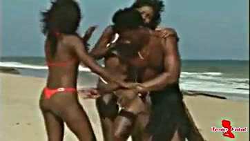 Three hot black women having wild beach sex