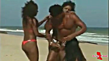 Three hot black women having wild beach sex