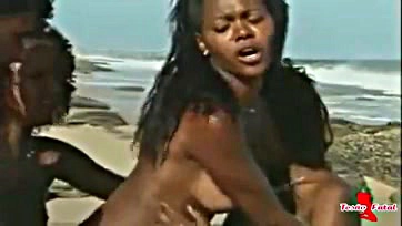 Three hot black women having wild beach sex